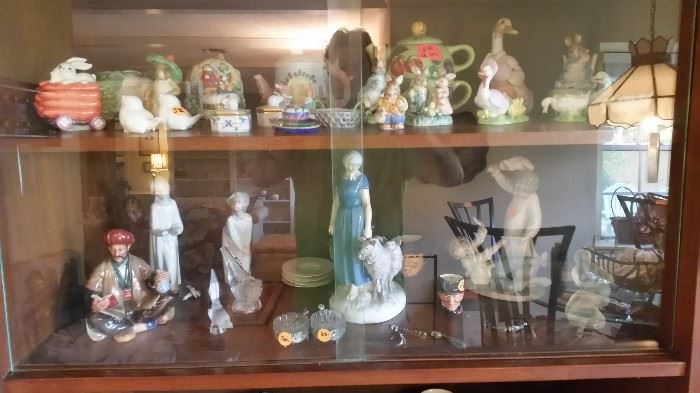 Collection of various porcelain and crystal manufacturers like Lladro, Royal Doulton, Beatrix Potter, Lalique, Sabino and Belleek.