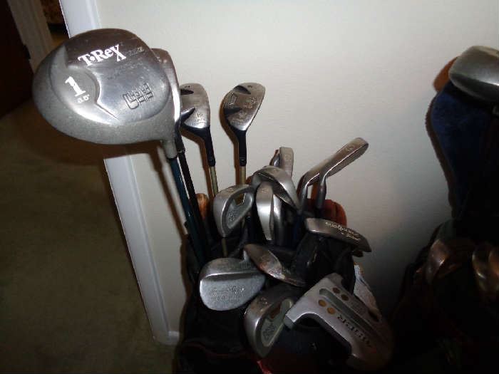 One of 3 fully loaded golf bags, golf balls, tees, etc. included