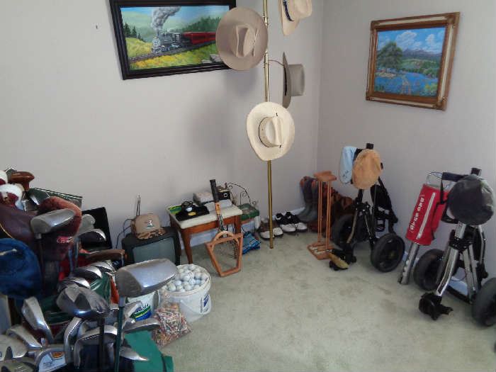 3  sets golf clubs/ loaded bags, 2 caddie carts, golf shoes, cowboys boots, Stetson hats, hundreds of golf balls 10 cents each or by the whole bucket $10.00 (3)