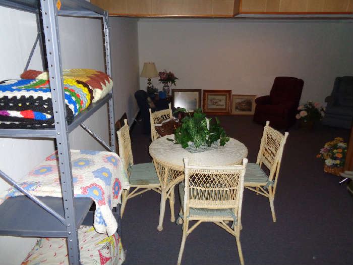 Antique quilts & comforters, antique Wicker table/four chairs, recliners, power leg lift recliner, framed oil paintings, flowers/vases