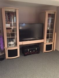 Custom light wood wall unit. Also can be used as a media center or entertainment center both ends have shelving and the middle is for your tv. Shelving has electronic components.paid $$$$, ASKING $300