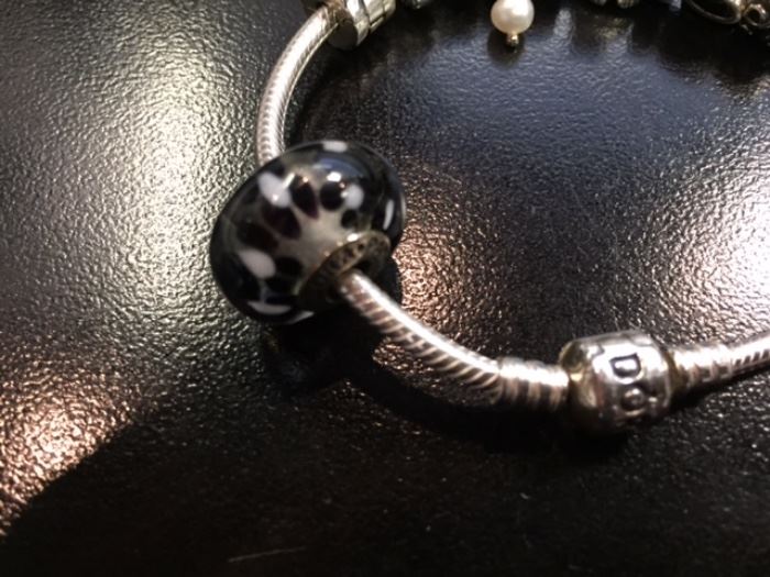 Pandora charm bracelets two available, Sterling silver with charms. Not at the Highland Park sale, ask Kathy for details. Asking $200