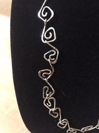 Silver geometric shaped chain in Sterling Silver. No signature, but looks similar to Georg Jensen $$250