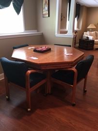 Game table hidden under top, bumper pool , with fabric covered chairs , EXCELLENT CONDITION, not at this sale. In Hawthorn Woods ASKING $650