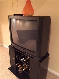 Old tube tv, works fine, tv cabinet, $25 just not Liquor, 