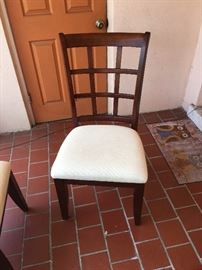 Regular chair (4) that accompany mahogany dining table. 