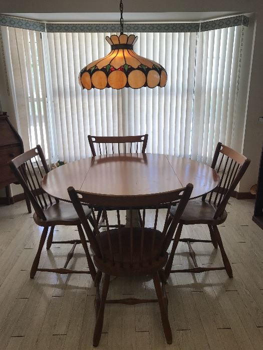 Chairs by Sprague& Carleton " Solid Rock Maple"  Drop leaf table is 48 wide as shown, drop leafs 12' each, has an iron base that has been married to table 