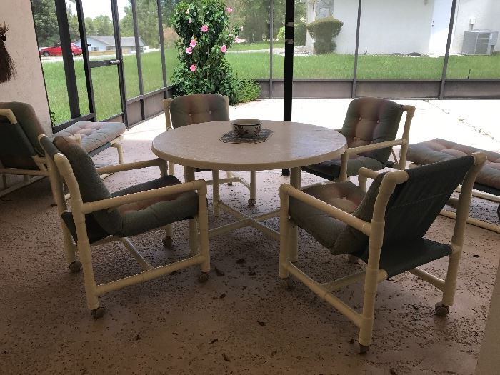 Patio set with two loungers, plant cart, towel rack 