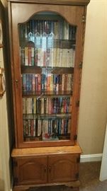 Cabinet with glass shelving, bottom storage area (books not included)
