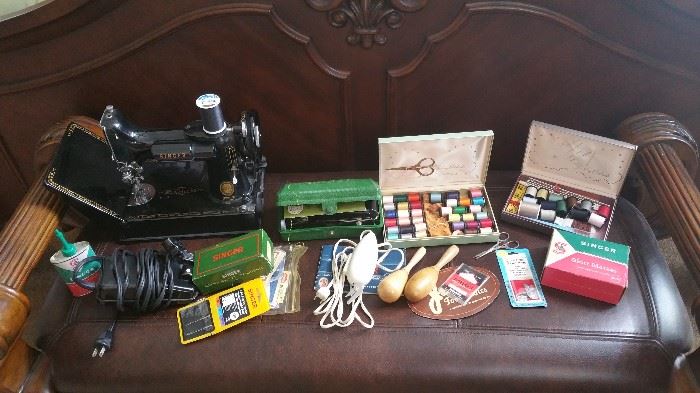 Vintage Singer 221 Featherweight sewing machine with various attachments--runs great.  Produced between 1954 - 59.  Other various vintage sewing boxes/materials