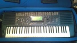Yamaha PSR-520 keyboard with soft case and stand