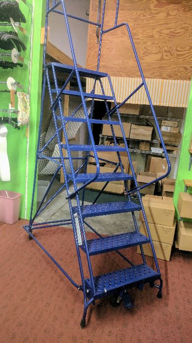 8 step rolling staircase. In excellent condition.