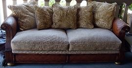 Elegant ourdoor/indoor sofa with wicker accents