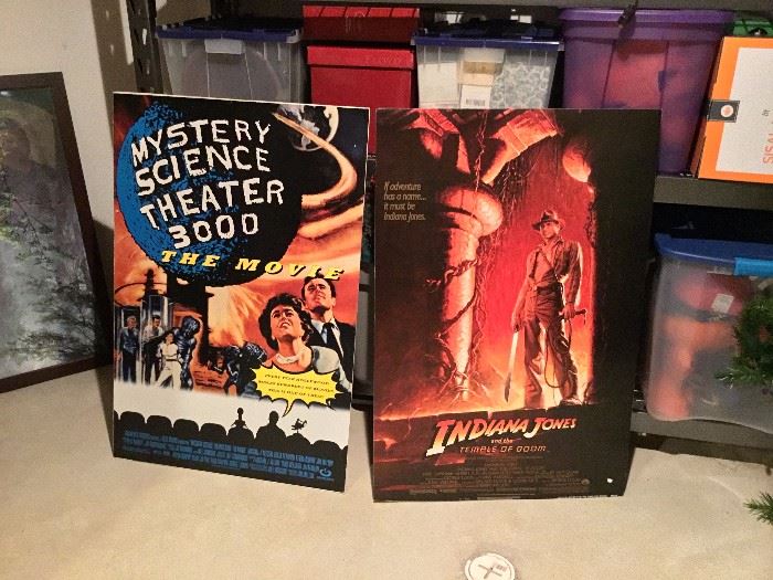 Indiana Jones and Mystery Science Theater movie posters mounted on thick stock