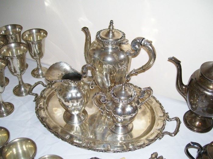 Sterling tea set - one of two.