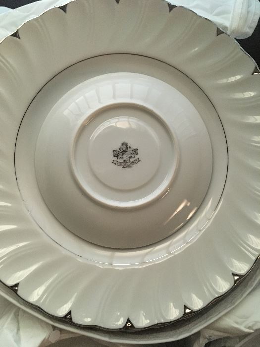 1960's mid-century Harmony House 'Heirloom' Fine China 98 piece, 12 place setting with serving dishes. No chips, cracks, or signs of wear. Storage cases included. 