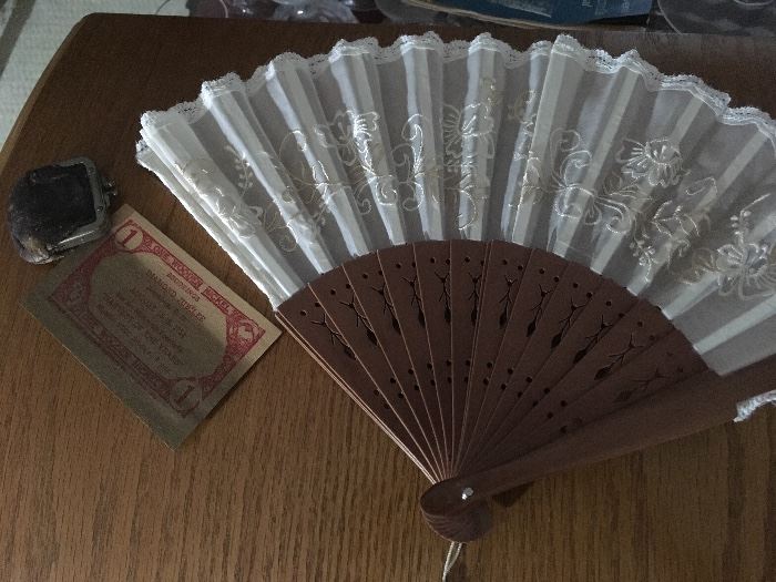 Misc vintage items: fan, leather coin purse & wooden dollar. 