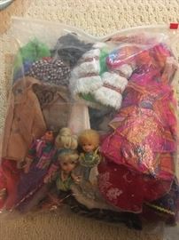 Large bag of vintage Mattel Barbie, Ken, Skipper & Francie clothes. Also includes mini Ken doll, mini Mrs. Beasley doll, and Liddle Kiddle Lenore Limousine. 