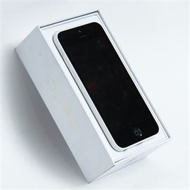 White iPhone 5S: A white Apple iPhone 5S with black face and screen, and with original box. Model number A1532.