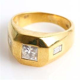 18K Yellow Gold and 1.00 CTW Flush Set Diamond Flat Top Ring: A 14K yellow gold flat top ring featuring one center flush set princess cut diamond flanked by two flush set baguette cut diamonds with a total carat weight of 1.00 ctw.