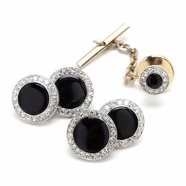 Art Deco Janesich Platinum and Diamond Cufflinks and Tie Tack: A pair of Art Deco platinum, diamond and onyx cufflinks with the coordinating tie tack designed by Janesich Jewelers, founded in 1835 by Leopold Janesich, Trieste, Italy. Janesich jewelry was highly coveted by the Austrian aristocracy as well as the Italian bourgeoisie, their style after WWII focused on Art Deco in keeping with the fashion of the time. The cufflinks are designed with a round onyx disc surrounded by diamonds set in platinum.