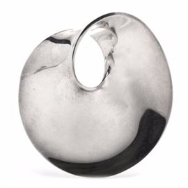 Georg Jensen Sterling Silver Mobius Brooch by Vivianna Torun: A vintage Georg Jensen sterling silver Mobius No. 374 brooch designed by Vivianna Torun in the 1970’s in a swirl design that is both contemporary and timeless. The brooch has a bar pin across the back and is appropriately stamped with the circular logo and 925 “S” Denmark.