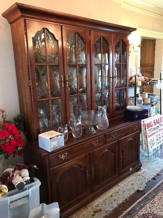 Buffet/hutch that matches the DR table & chairs.  It's filled with decanters and other glassware