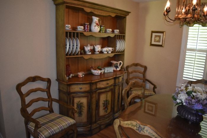 The French Country Style Step-back cupboard was SOLD on line prior to the ONE DAY sale with the dining room set