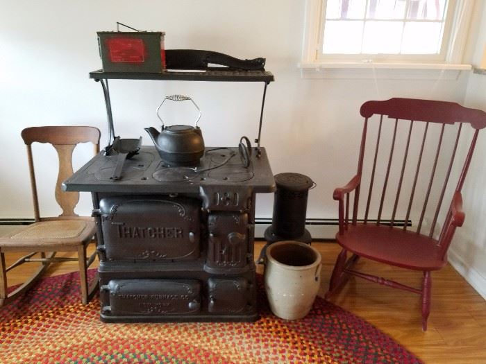Thatcher stove, antique rocking chairs