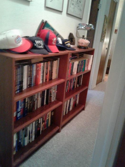 books, bookcases galore, hat collection