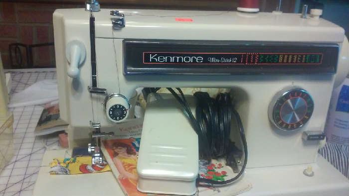 Kenmore, makes a nice stitch.  Kept very clean by its former owner