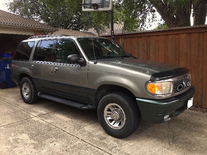 1999 Mercury Mountaineer 4X4. 210-hp V6 engine with a 5 speed automatic transmission w/OD getting on average 17mpg. Color is a 'Spruce Green' with a 'Graphite Grey' interior. One owner, 120K miles which averages to about 6,600 miles a year.. NICE!! 