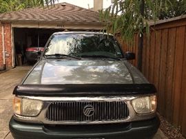 1999 Mercury Mountaineer 4X4. 210-hp V6 engine with a 5 speed automatic transmission w/OD getting on average 17mpg. Color is a 'Spruce Green' with a 'Graphite Grey' interior. One owner, 120K miles which averages to about 6,600 miles a year.. NICE!!