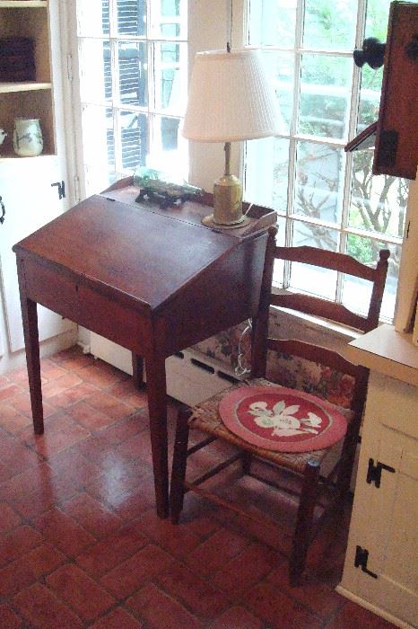 Mid 1800's lift top desk and shaker rush seat chair.