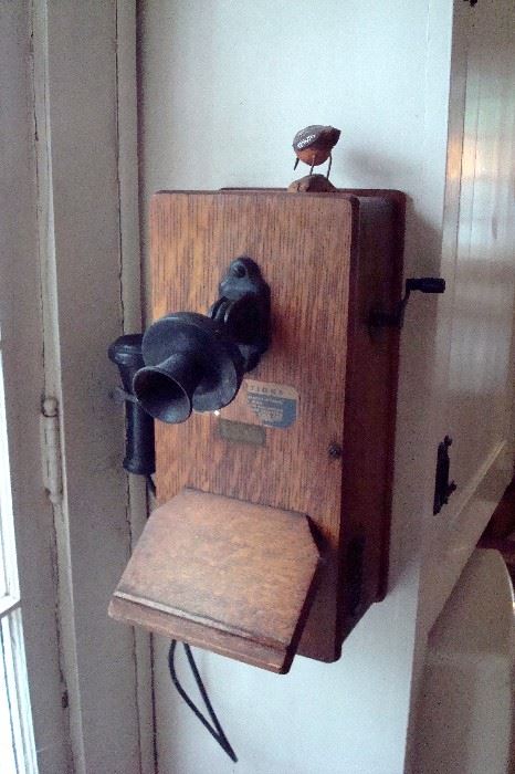 Antique oak wall telephone.