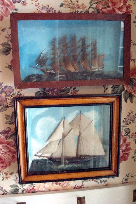 Half ships mounted in frames.