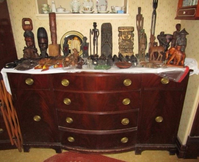 Mahogany buffet, large collection of hand carved wooden figures