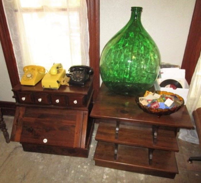 Vintage wooden tables, vintage telephones, large green glass vase, vintage matchbooks