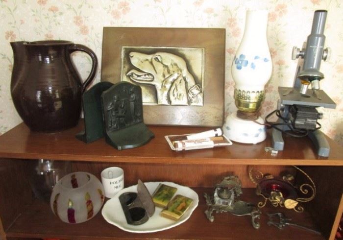 Signed metal dog picture, Bradley & Hubbard (B & H) bronze finish bookends, microscope, etc.