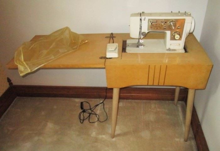 Vintage Penney's Sewing machine in cabinet