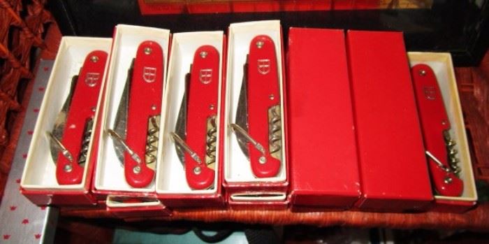 Many Swiss Army knives, new in boxes