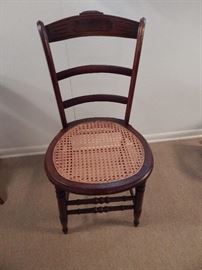 Cain Bottom Chair With Carved Etching on Back, Carved Front Legs