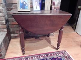 Drop Leaf Farm Table With Metal Rollers