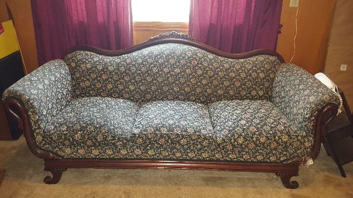 75 year old couch with duck wood trim...this couch will need some repair in front right