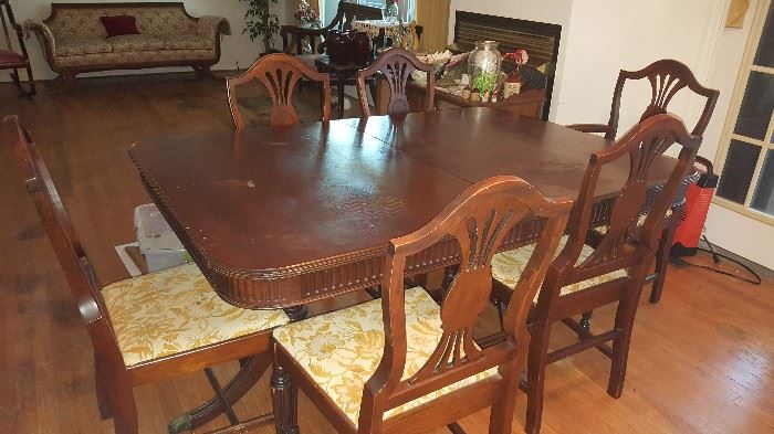 Nice old dining room table with 6 chairs and leaf insert to make it longer