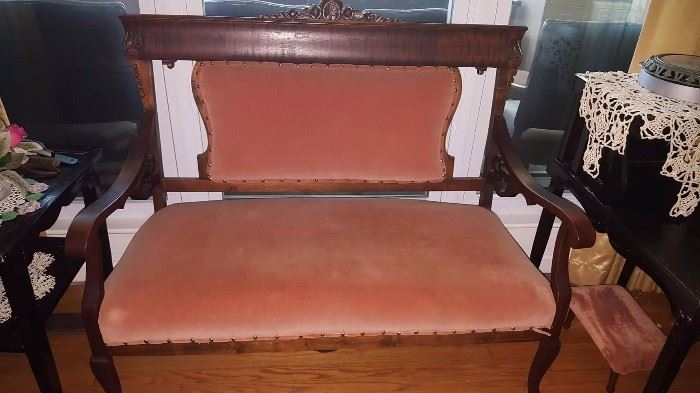 Antique settee with matching rocker and stool