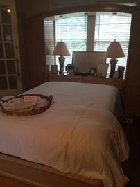 It is a Thomasville solid wood bed...and a statement piece...that has undercarriage lighting, plus display cabinets...and I love it!   Imagine this at a modern mountain house or your tweens bedroom, the price will sell you...