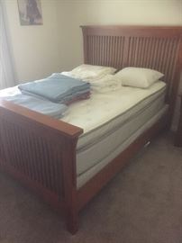 Bed frame w/ headboard and footboard.  Mattresses not for sale.