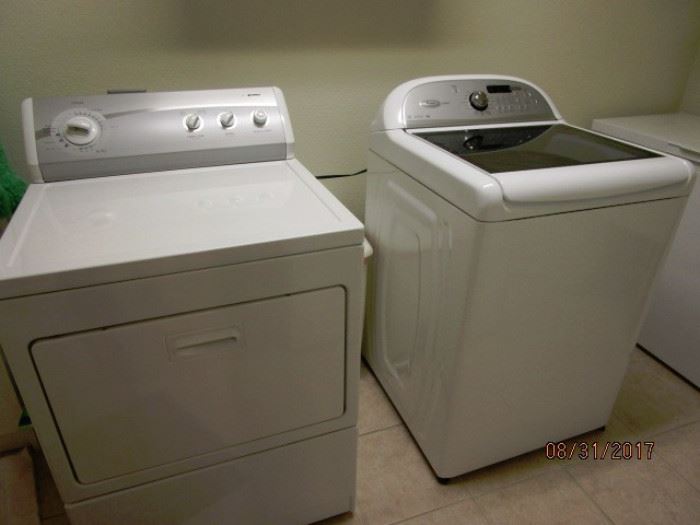 Washer and dryer.  Kenmore Dryer.  Whirlpool washer - top load.  Both in excellent condition.
