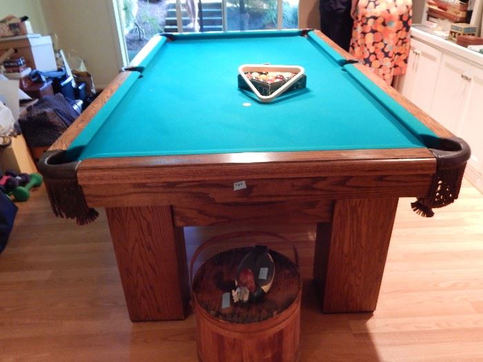 Pool Table with Indian Head Pennies in the tables rails 